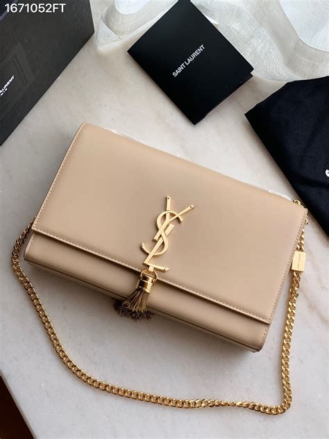 ysl kate clutch beige|farfetch ysl clutch.